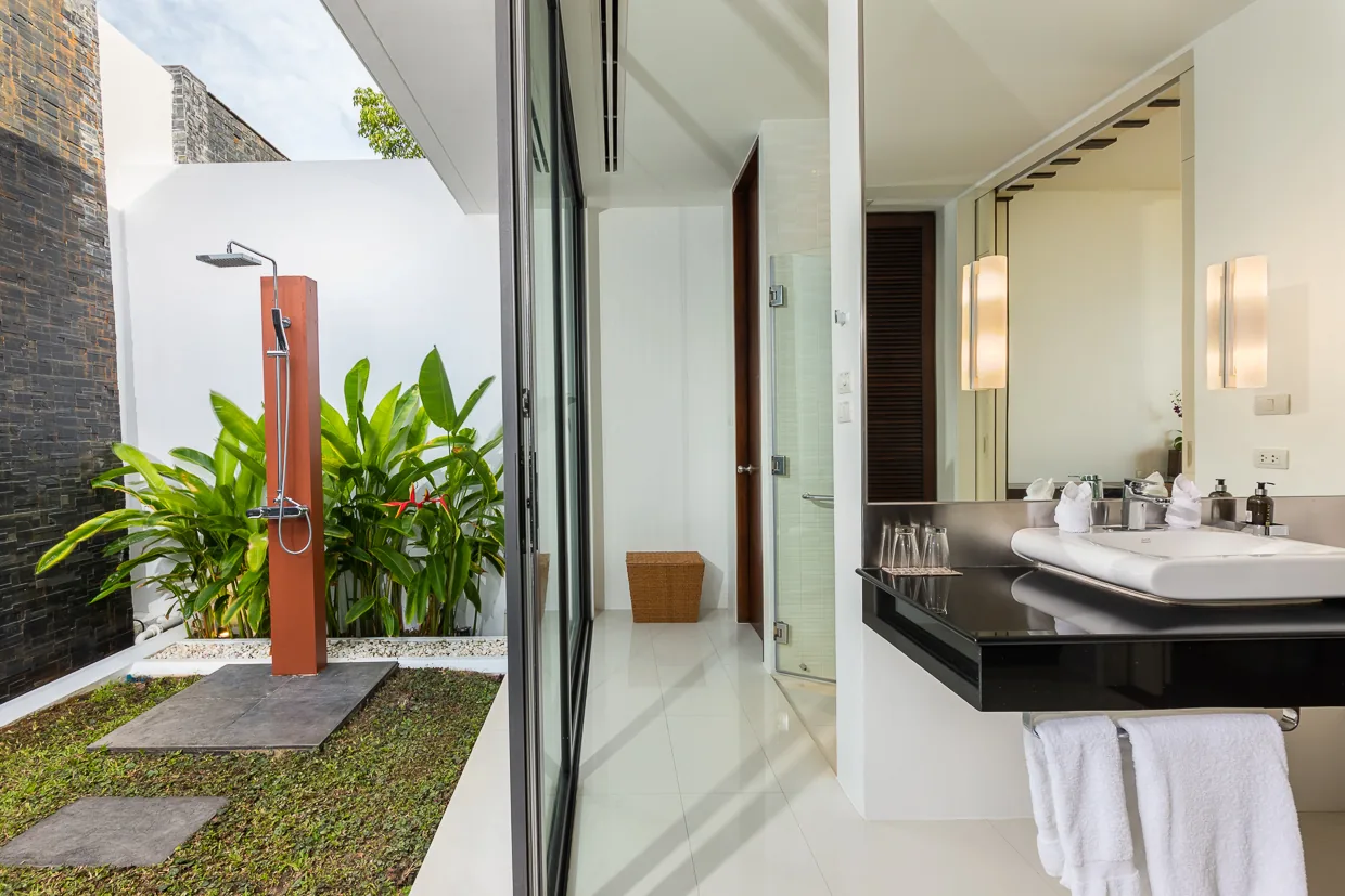 A Balinese style outdoor shower garden off one of the bedrooms