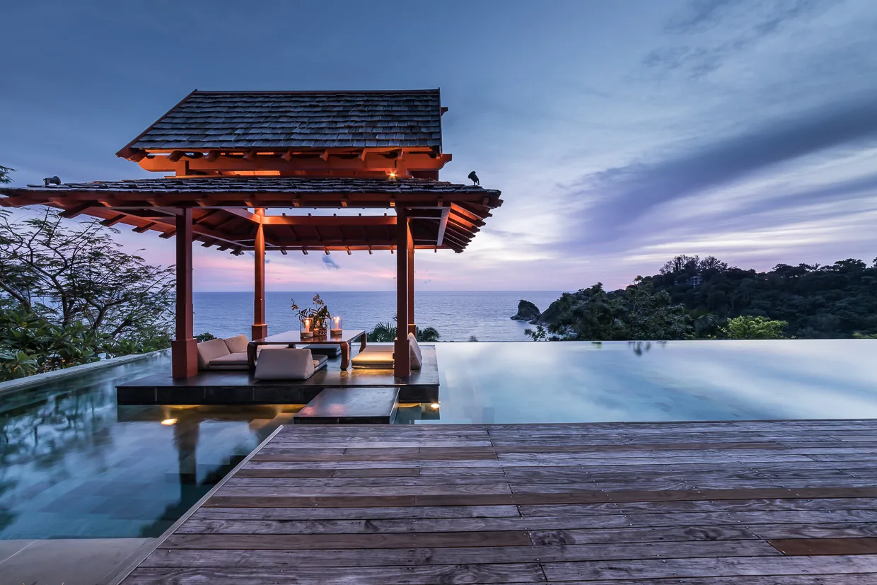 The sala on the infinity edge at blue hour